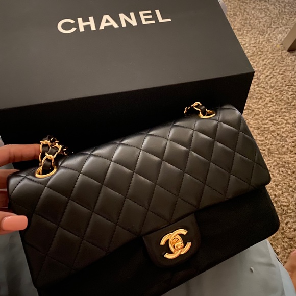 CHANEL Handbags - Chanel lamb skin Flap Bag Black and gold